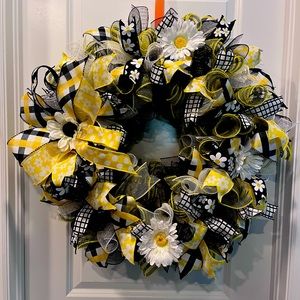 Beautiful large yellow, black and white daisy wreath for your front door.